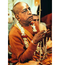 Prabhupada Chanting on New Disciple\'s Japa Beads at Initiation Ceremony