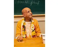 Srila Prabhupada Sitting in School Classroom Preaching