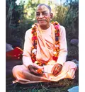 Srila Prabhupada in France, Holding a Marigold Flower