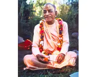 Srila Prabhupada in France, Holding a Marigold Flower