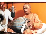 Srila Prabhupada at New Dvaraka, Playing Mrdanga at Studio